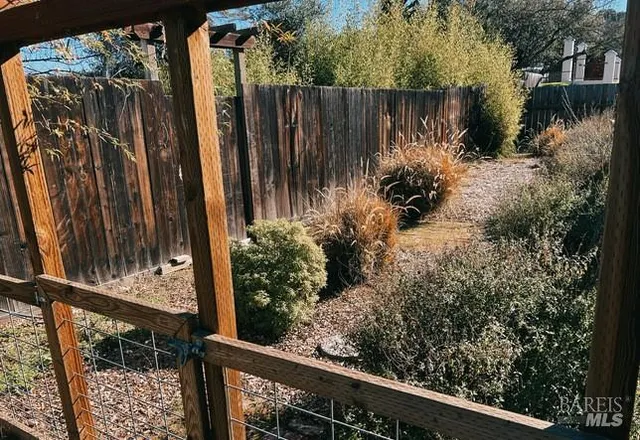 a view of a wooden fence
