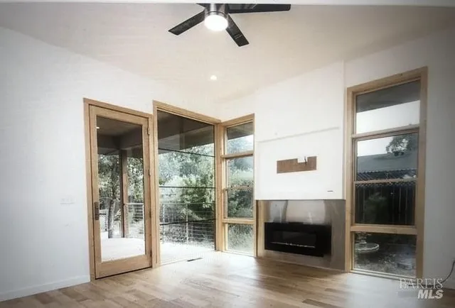 a view of livingroom with furniture and wooden floor