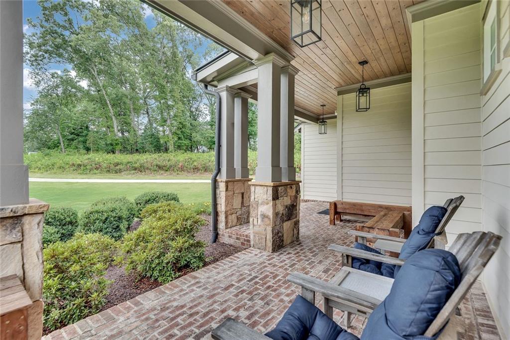 2503 Sugar Pike Road Canton, GA 30115 - Photo 54 of 134 a view of backyard with outdoor seating and green space