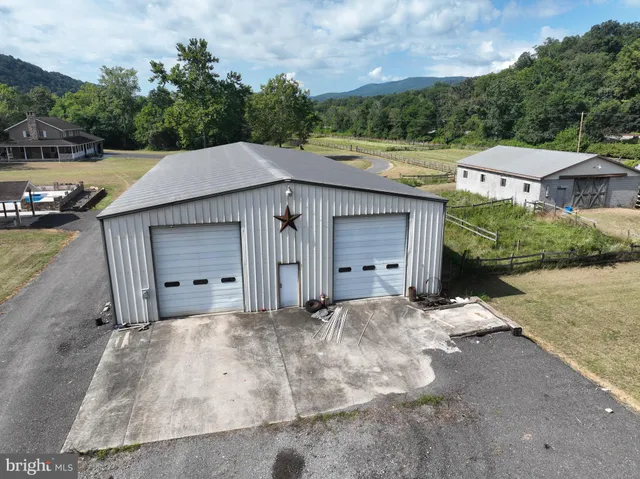 a house with trees in the background
