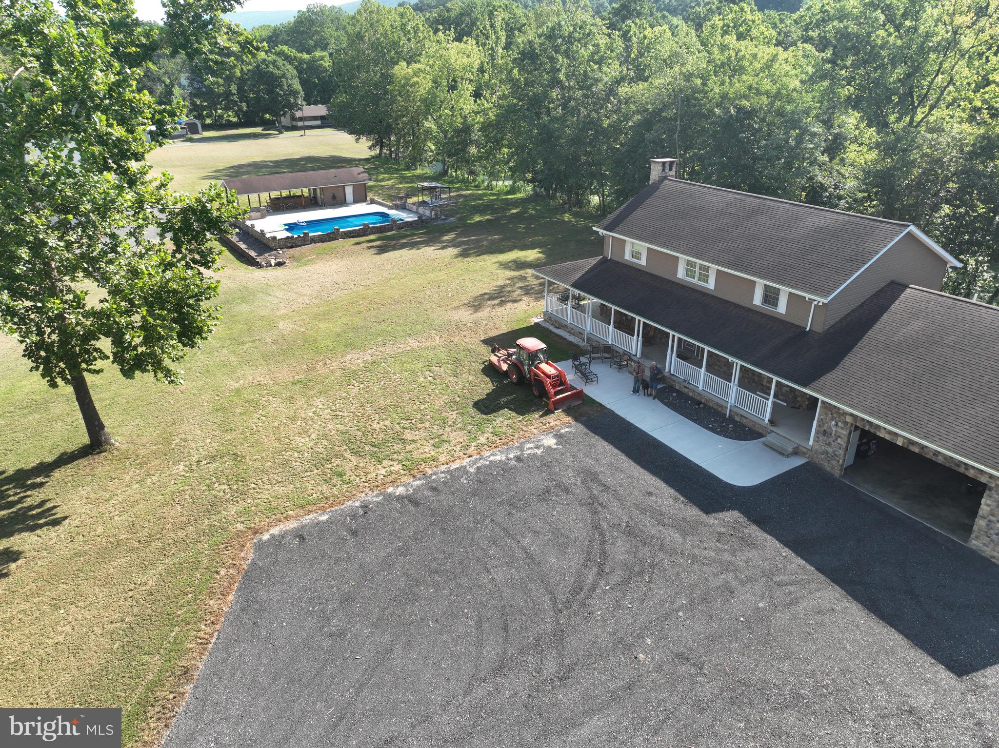13900 Schellsburg Road Ellerslie, MD 21529 - Photo 22 of 59 a view of a swimming pool with lounge chairs