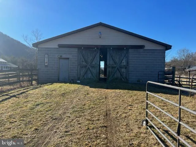a view of a yard with an outdoor space