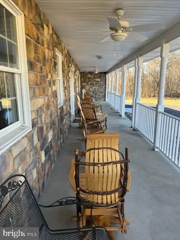 a table and chairs in a livingroom