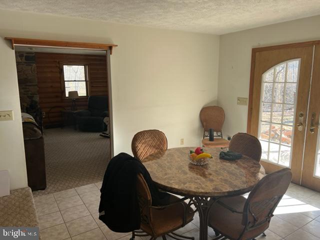 13900 Schellsburg Road Ellerslie, MD 21529 - Photo 33 of 59 a table and chairs in a livingroom