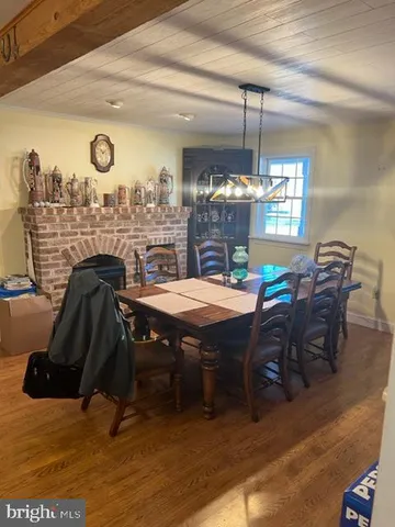 a bathroom with a sink toilet and mirror
