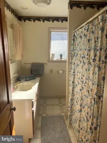 a view of a backyard of the house