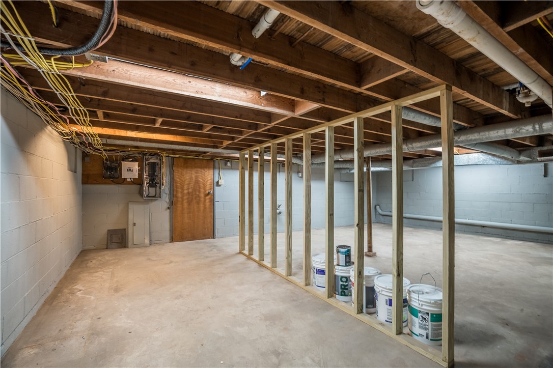 8240 Looney Road Piqua, OH 45356 - Photo 38 of 49 Unfinished basement space, ready for your personalized design and expansion.
