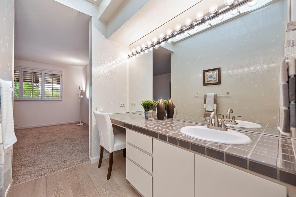 7650 Pineridge Road Fair Oaks, CA 95628 - Photo 47 of 67 a bathroom with a sink and a mirror
