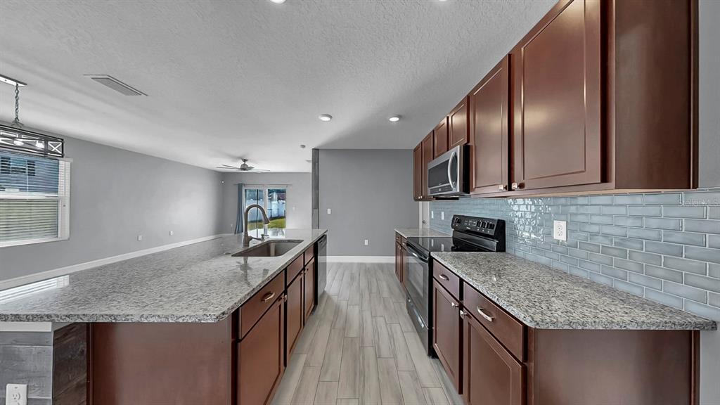 10237 Mangrove Well Road Sun City Center, FL 33573 - Photo 16 of 56