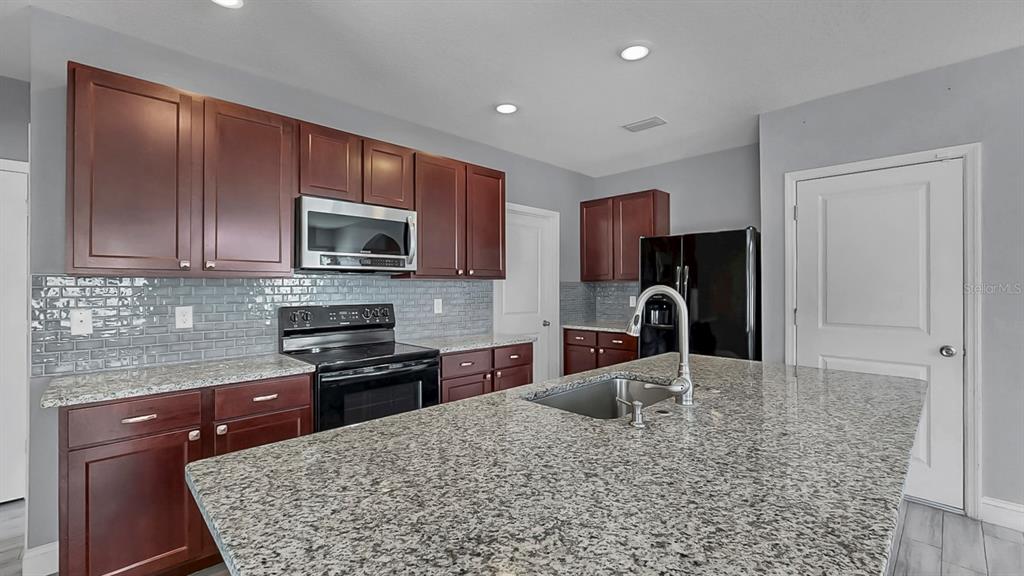 10237 Mangrove Well Road Sun City Center, FL 33573 - Photo 17 of 56