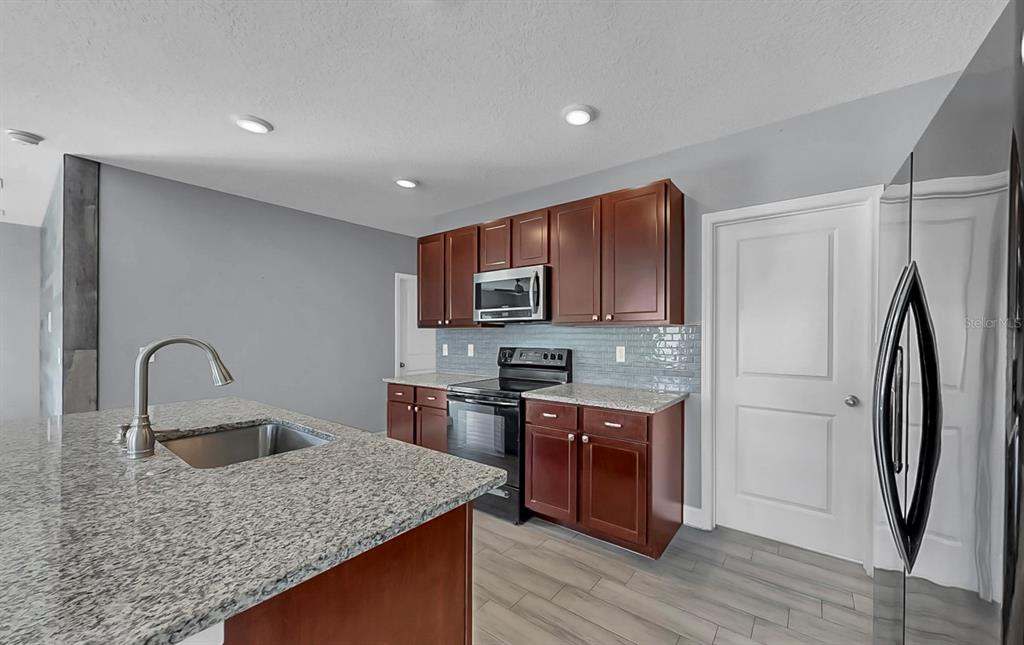 10237 Mangrove Well Road Sun City Center, FL 33573 - Photo 10 of 56