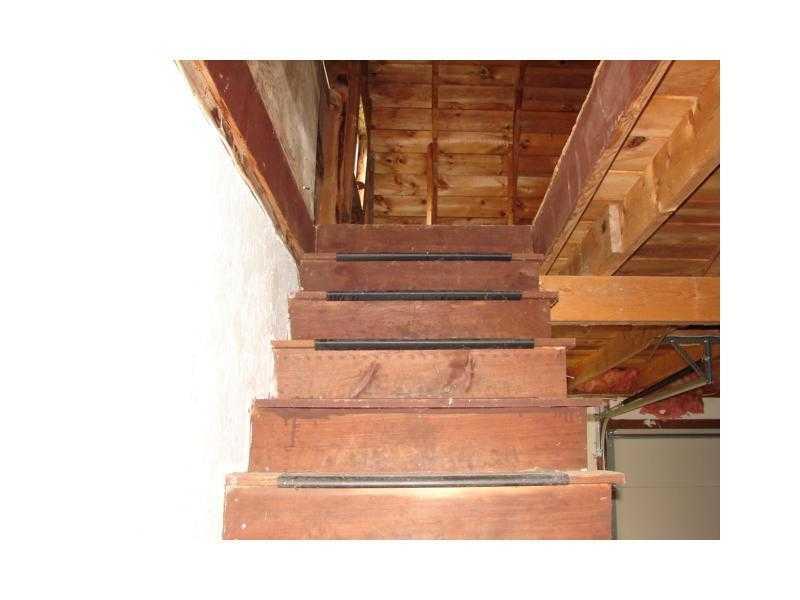 157 Port Road Machiasport, ME 04655 - Photo 22 of 25 Garage. Stairs in the garage that...
