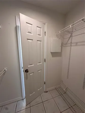 a spacious bathroom with a sink a vanity and mirror