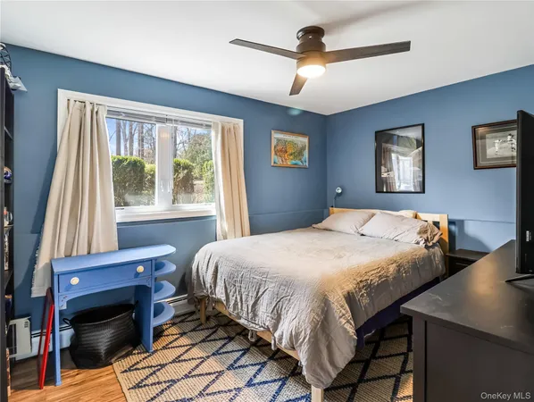 a room with gym equipment and a large window