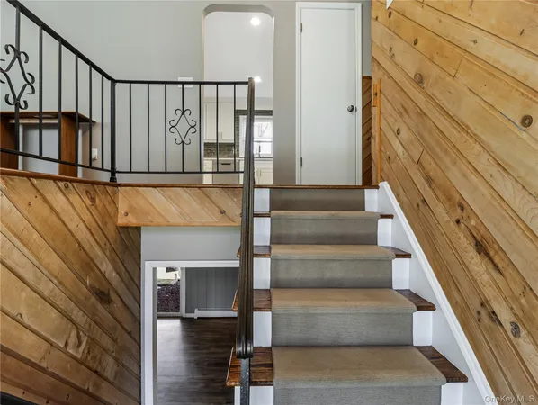 a kitchen with a stove top oven sink and cabinets