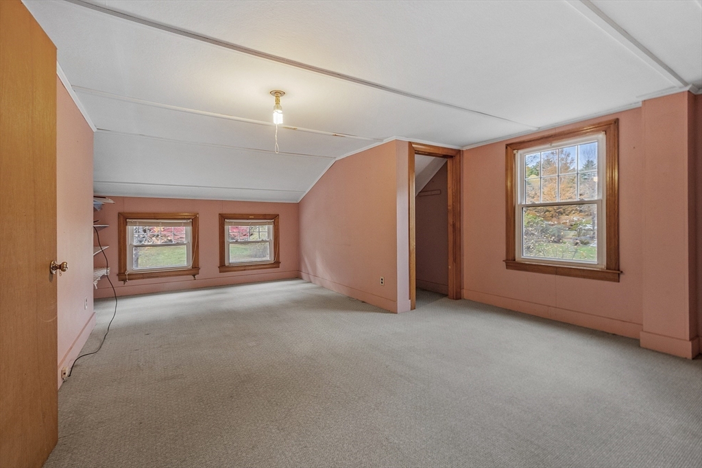490 South Main Street Orange, MA 01364 - Photo 15 of 37 an empty room with windows and closet