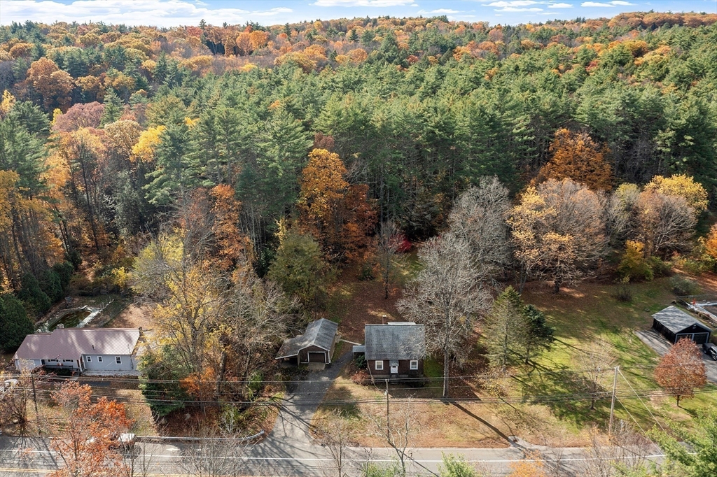 490 South Main Street Orange, MA 01364 - Photo 26 of 37 a view of a city with lush green forest