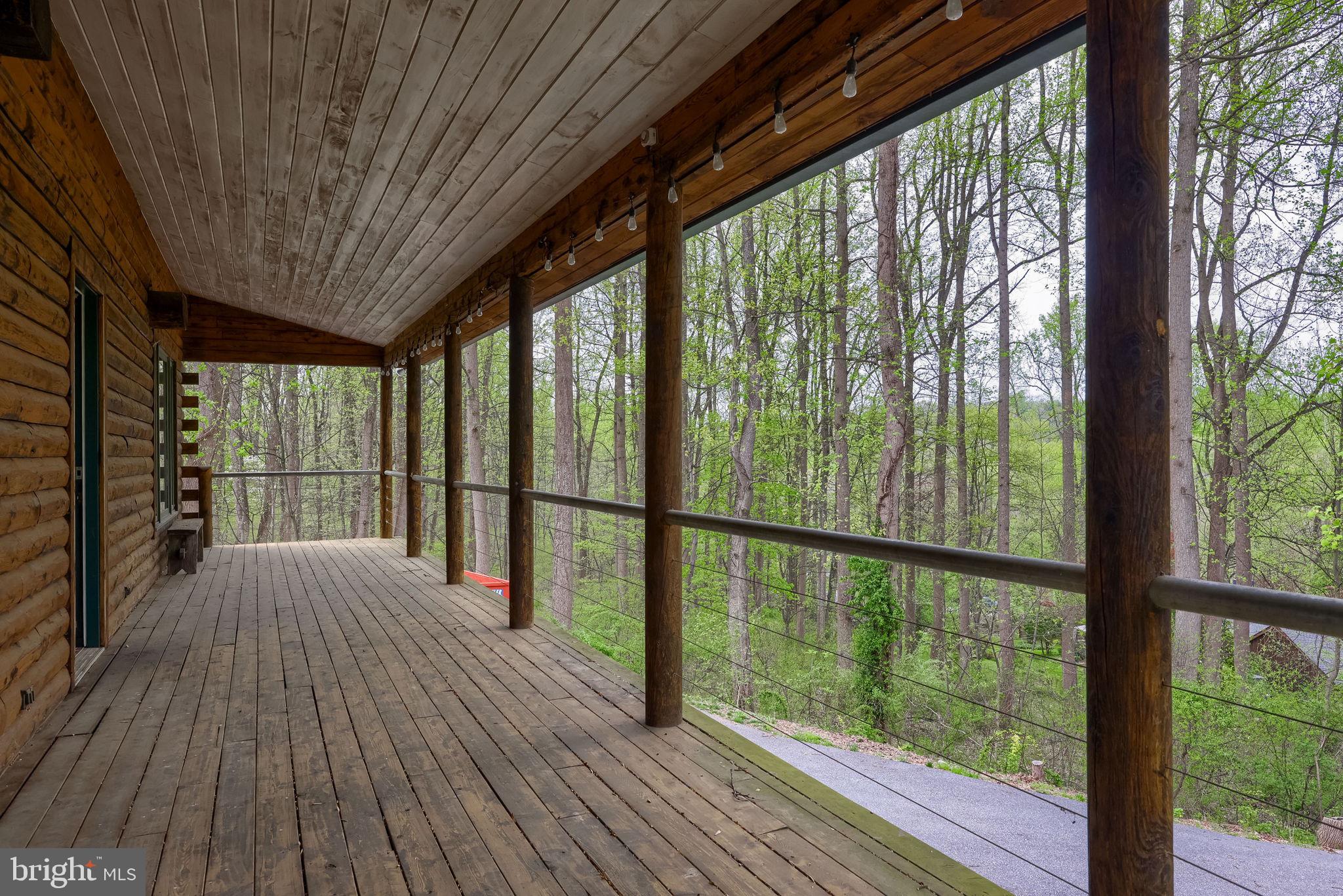 171 Fox Hollow Road Pequea, PA 17565 - Photo 5 of 28 Serene porch with forest views.