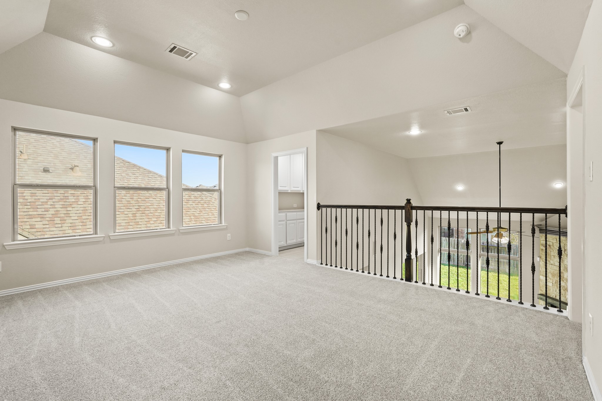 10335 Belvamera Road Richmond, TX 77407 - Photo 19 of 27 a view of an empty room with a window