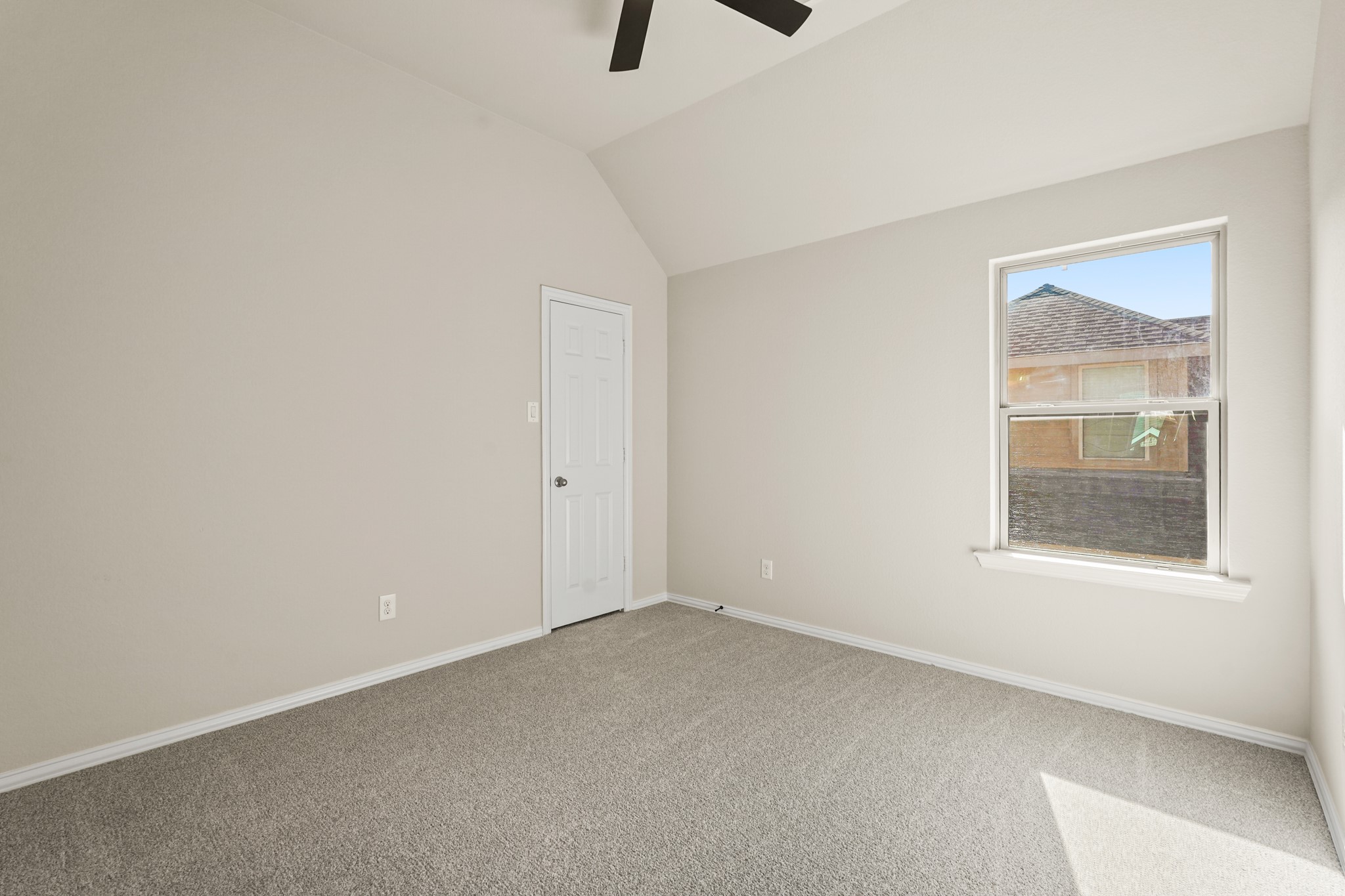 10335 Belvamera Road Richmond, TX 77407 - Photo 24 of 27 an empty room with a window