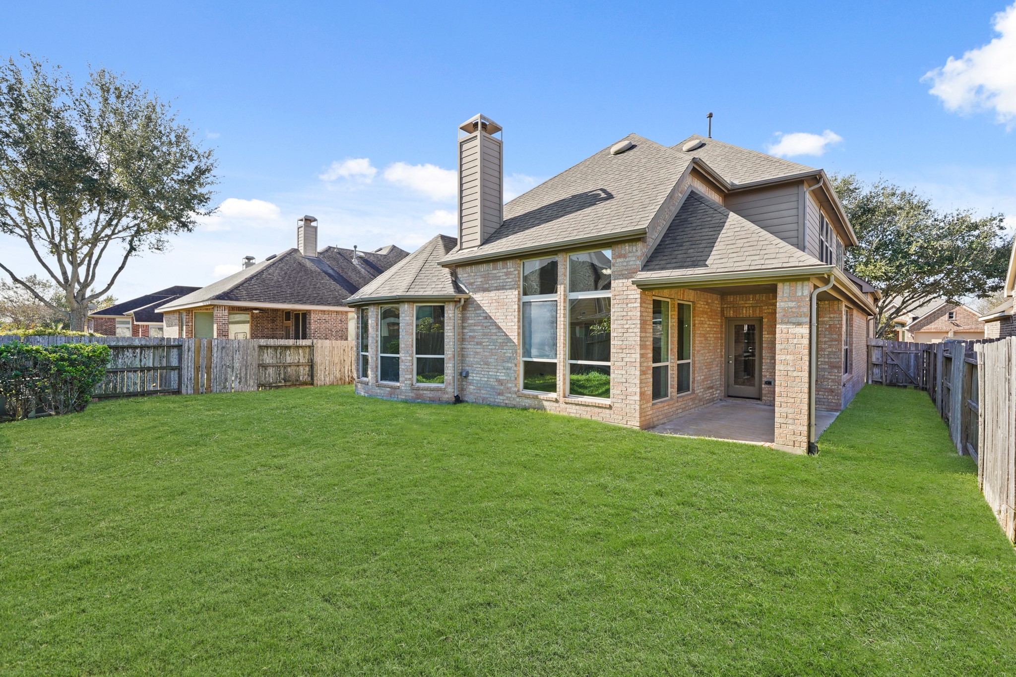 10335 Belvamera Road Richmond, TX 77407 - Photo 27 of 27 a front view of a house with a yard