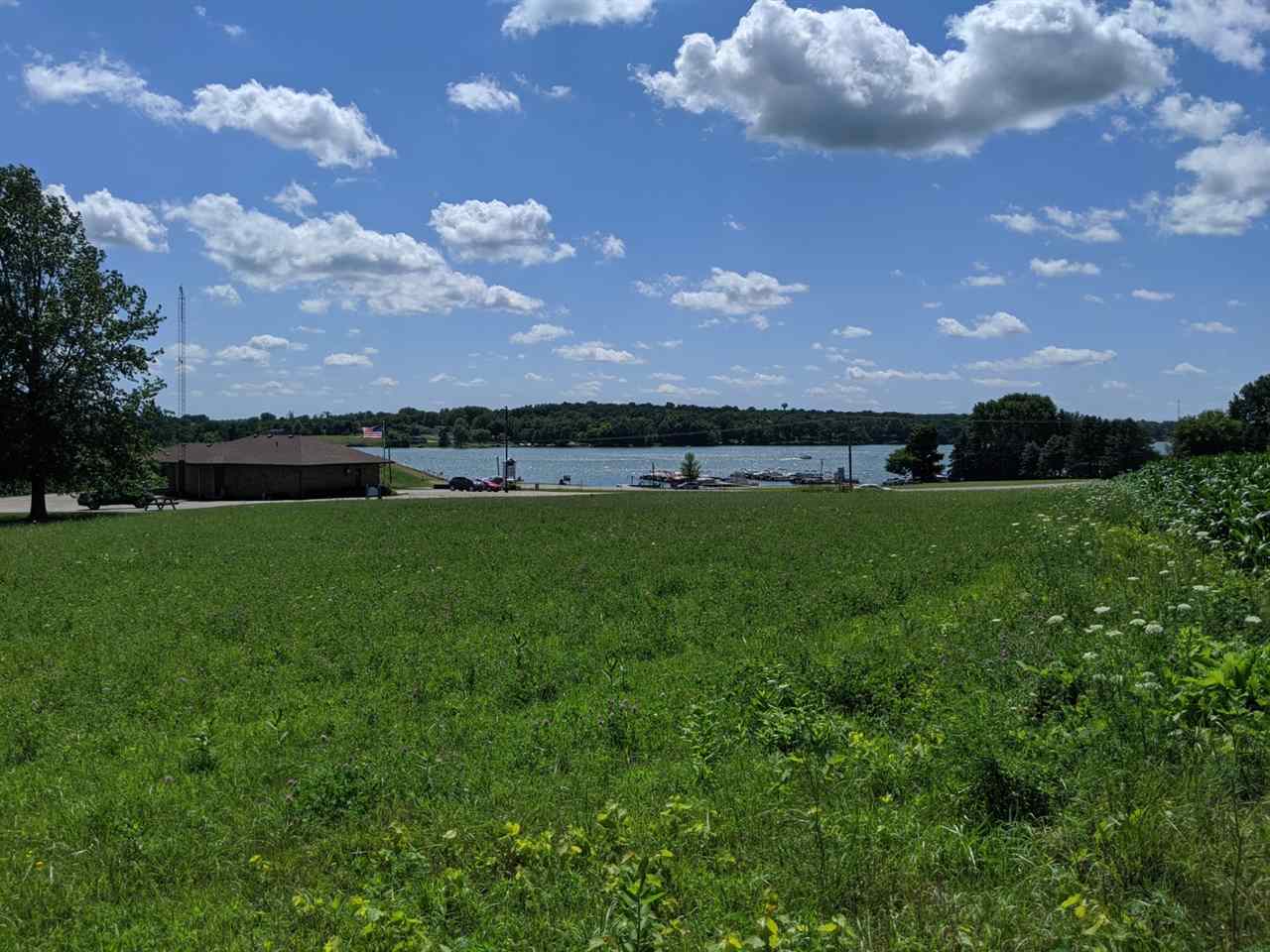 13711 Best Road Davis, IL 61019 - Photo 1 of 6 a view of a golf course with a lake