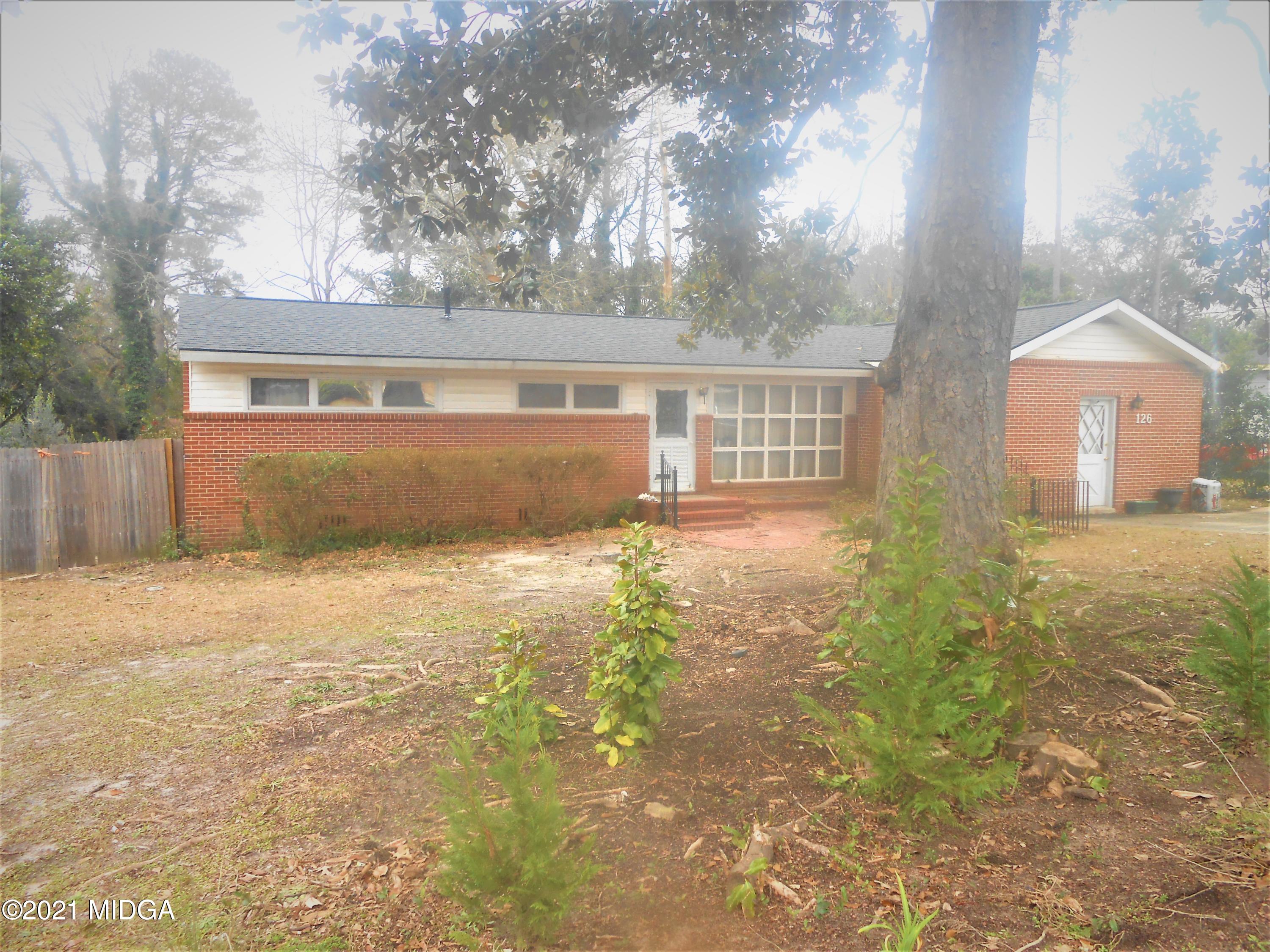 126 Carter Circle Warner Robins, GA 31093 - Photo 1 of 13 front view of a house with a yard