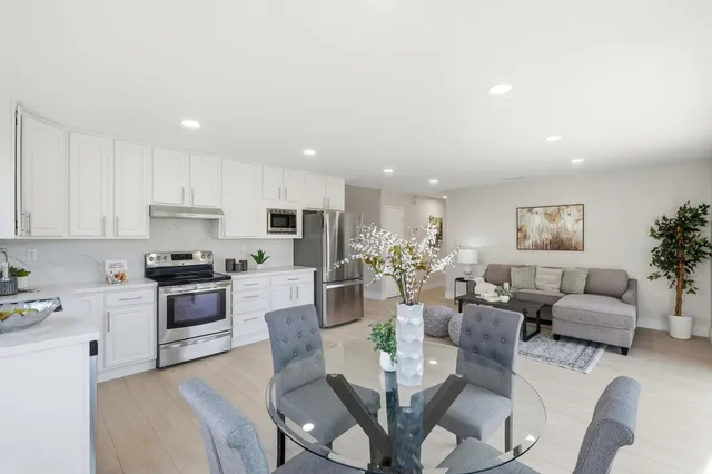 a view of a dining room with furniture