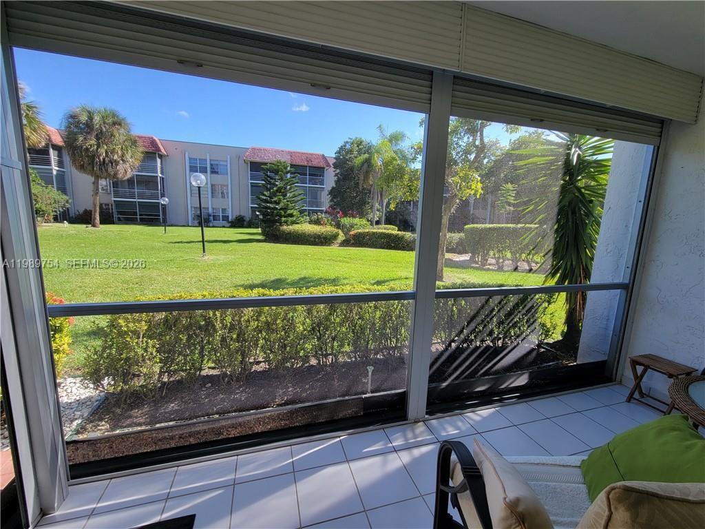 3774 Inverrary Boulevard, Unit 103P Lauderhill, FL 33319 - Photo 33 of 35 a view of a two chairs in the patio