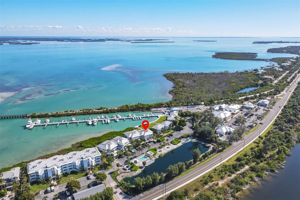 5854 Gasparilla Road, Unit MV20 Boca Grande, FL 33921 - Photo 33 of 49 a view of a city and ocean view