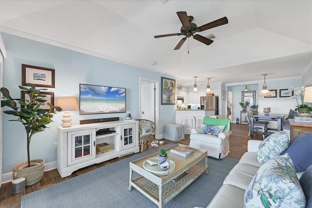 5854 Gasparilla Road, Unit MV20 Boca Grande, FL 33921 - Photo 10 of 49 a living room with furniture and a flat screen tv