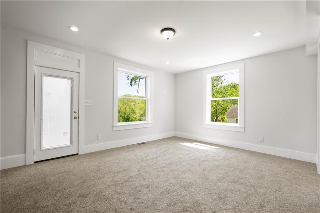 4575 Prosperity Pike Prosperity, PA 15329 - Photo 21 of 46 an empty room with windows and closet