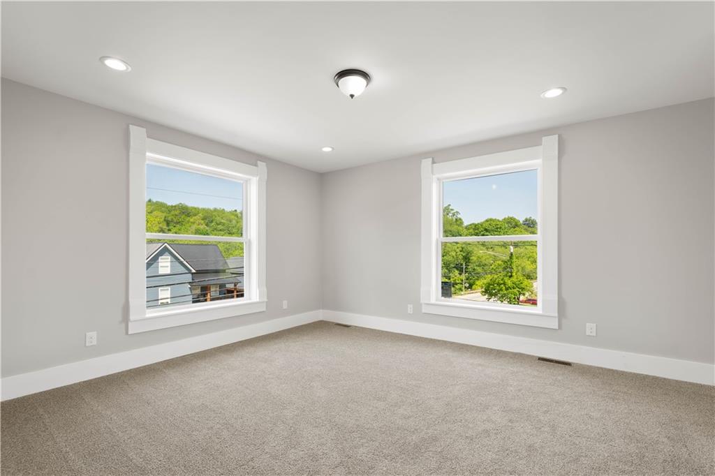 4575 Prosperity Pike Prosperity, PA 15329 - Photo 27 of 46 an empty room with windows and view of window
