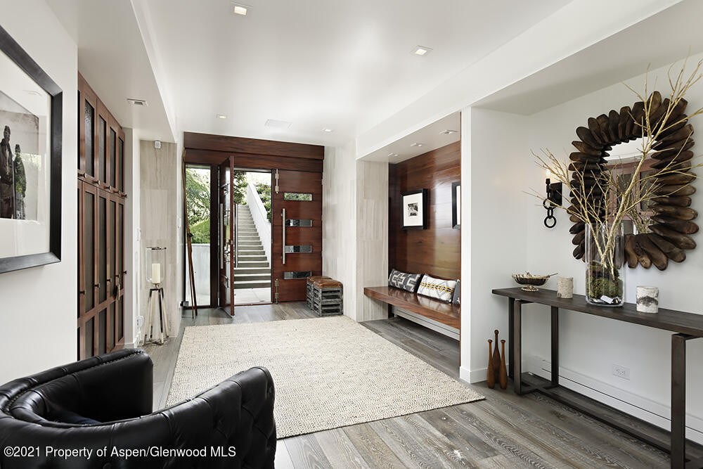 546 Edgewood Lane Snowmass Village, CO 81615 - Photo 13 of 60 a living room with furniture and a flat screen tv