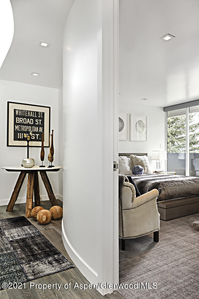 546 Edgewood Lane Snowmass Village, CO 81615 - Photo 41 of 60 a living room with furniture and a gym machine