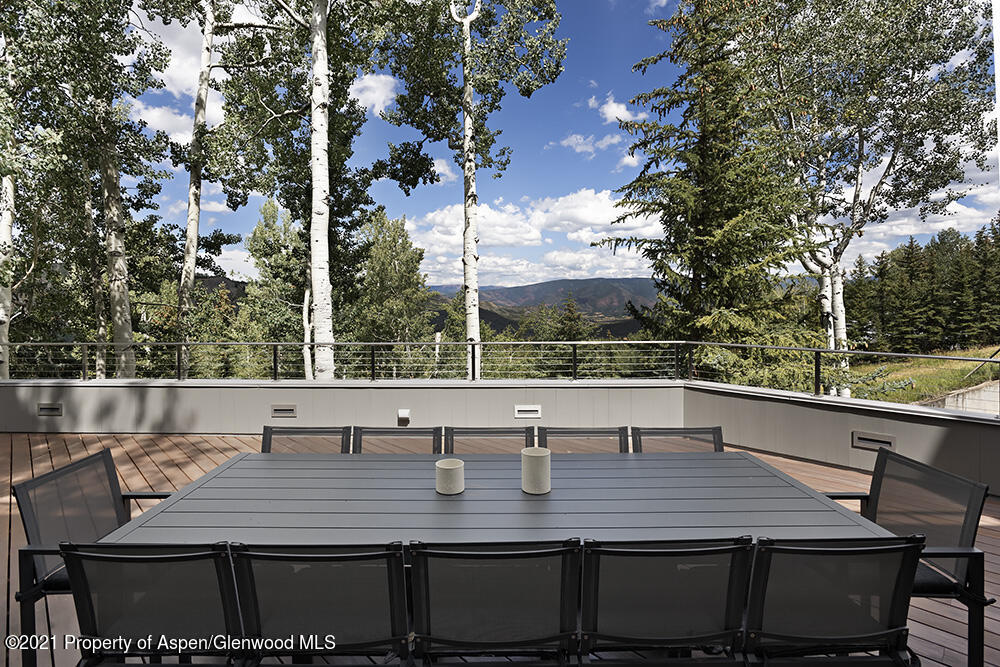 546 Edgewood Lane Snowmass Village, CO 81615 - Photo 46 of 60 a view of an outside dining space with furniture