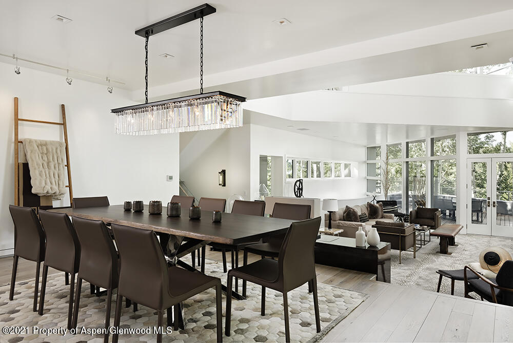 546 Edgewood Lane Snowmass Village, CO 81615 - Photo 5 of 60 a view of a a dining room with furniture window and outside view