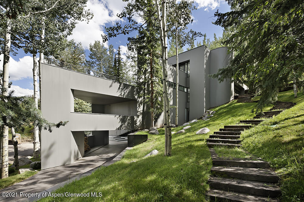 546 Edgewood Lane Snowmass Village, CO 81615 - Photo 51 of 60 a view of a couches in backyard of house