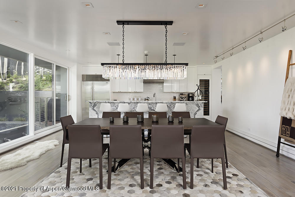 546 Edgewood Lane Snowmass Village, CO 81615 - Photo 7 of 60 a view of a dining room with furniture