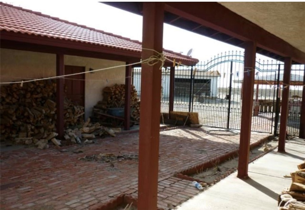 6888 Bookasta Street Adelanto, CA 92301 - Photo 16 of 19 a view of a porch