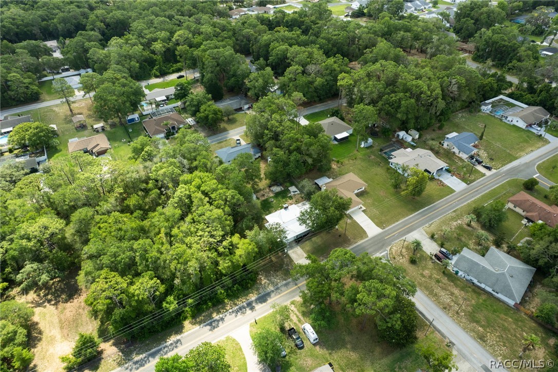 1140 South Highlands Avenue Inverness, FL 34452 - Photo 39 of 54 an aerial view of a residential houses with outdoor space