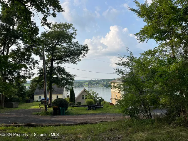 a view of an outdoor space with a lake view