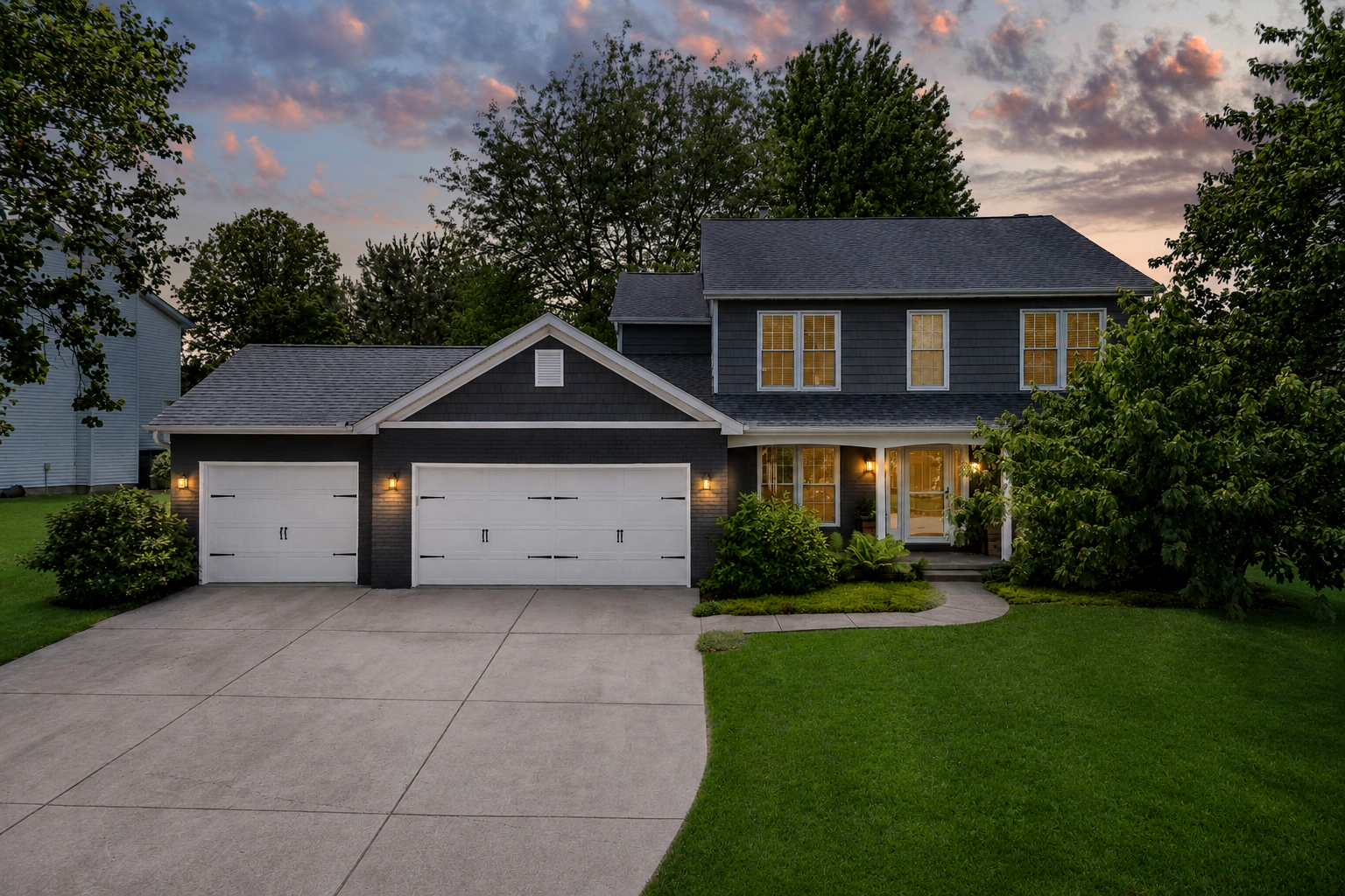 3203 Eagle Crest Road Bloomington, IL 61704 - Photo 51 of 52 a front view of a house with garden
