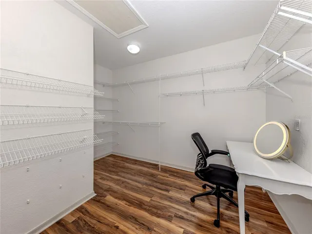 a view of a room with racks on the wall