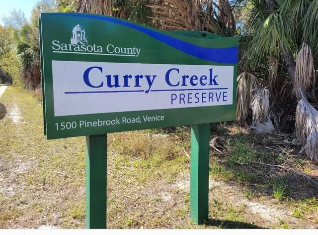 a sign broad on wooden wall
