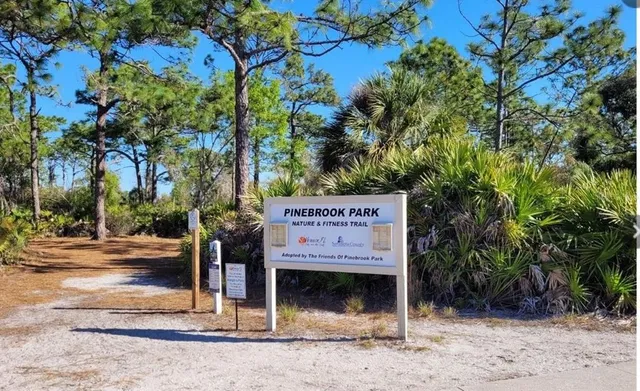 a sign on the side of a road