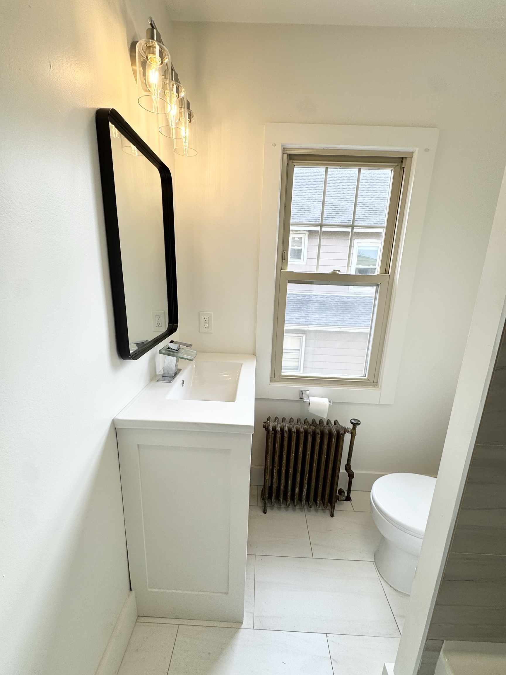 162 High Street Naugatuck, CT 06770 - Photo 18 of 25 a bathroom with a sink a toilet and mirror