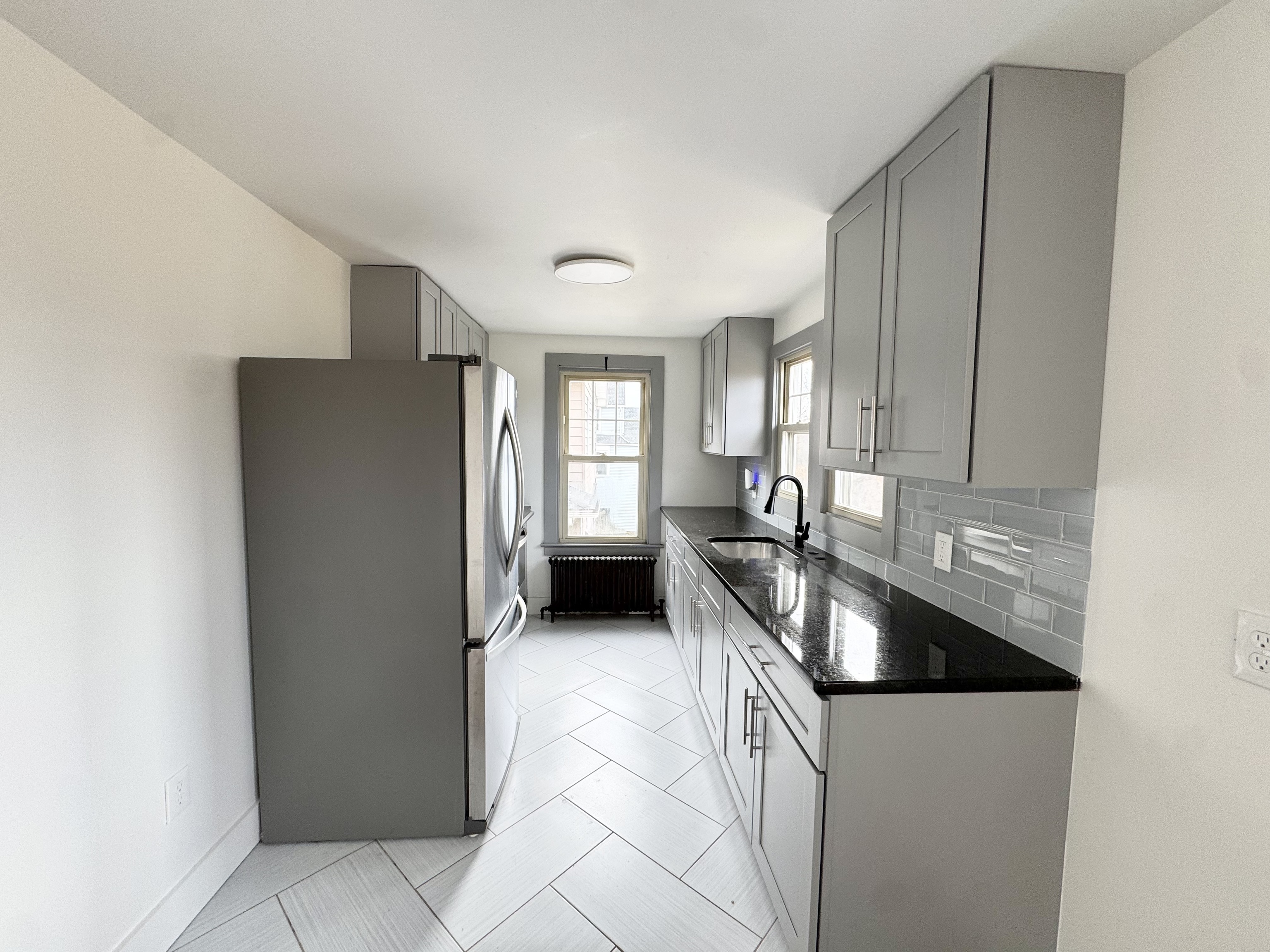 162 High Street Naugatuck, CT 06770 - Photo 2 of 25 a kitchen with a refrigerator and a sink
