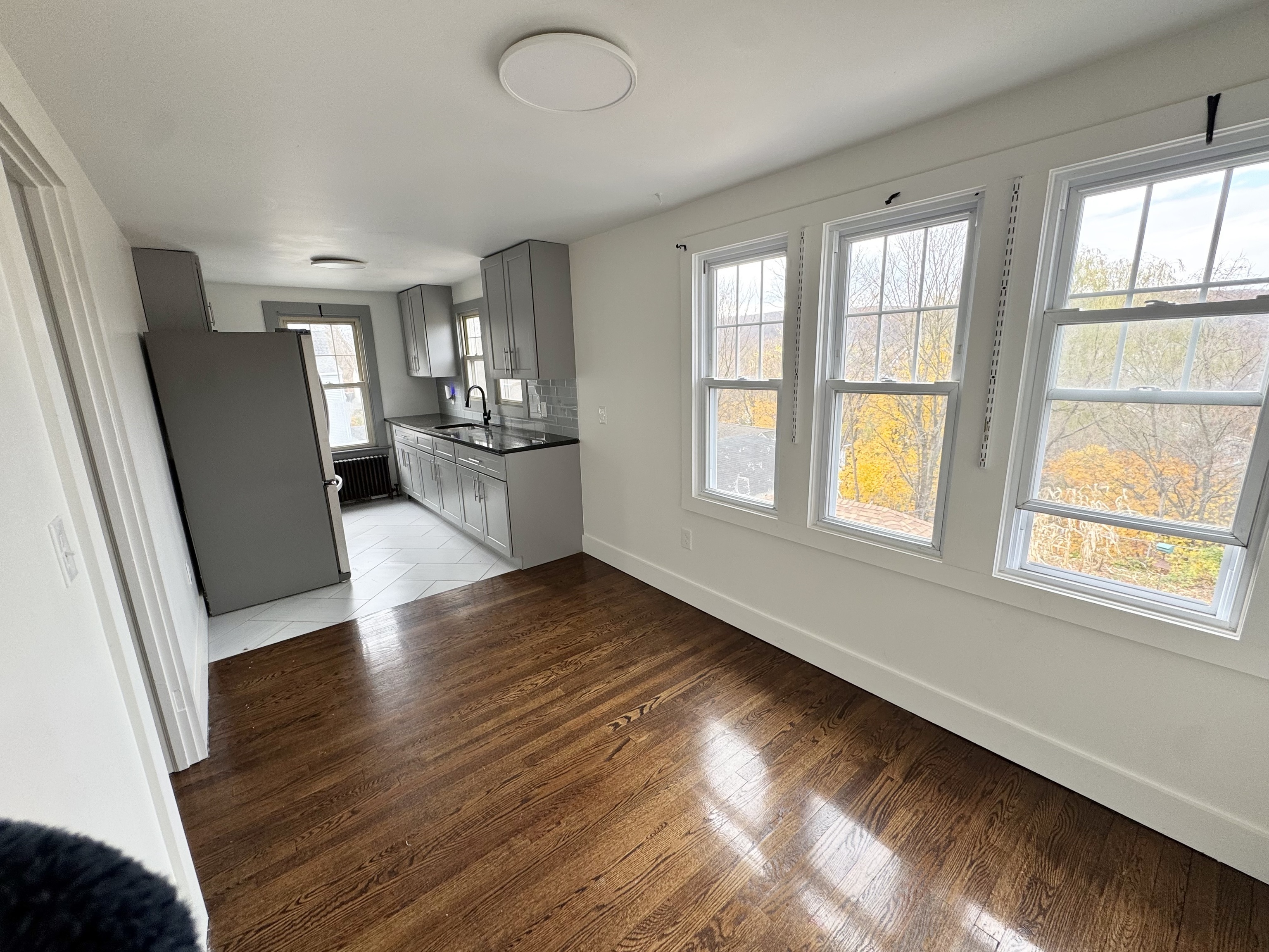 162 High Street Naugatuck, CT 06770 - Photo 9 of 25 wooden floor in an empty room with a window