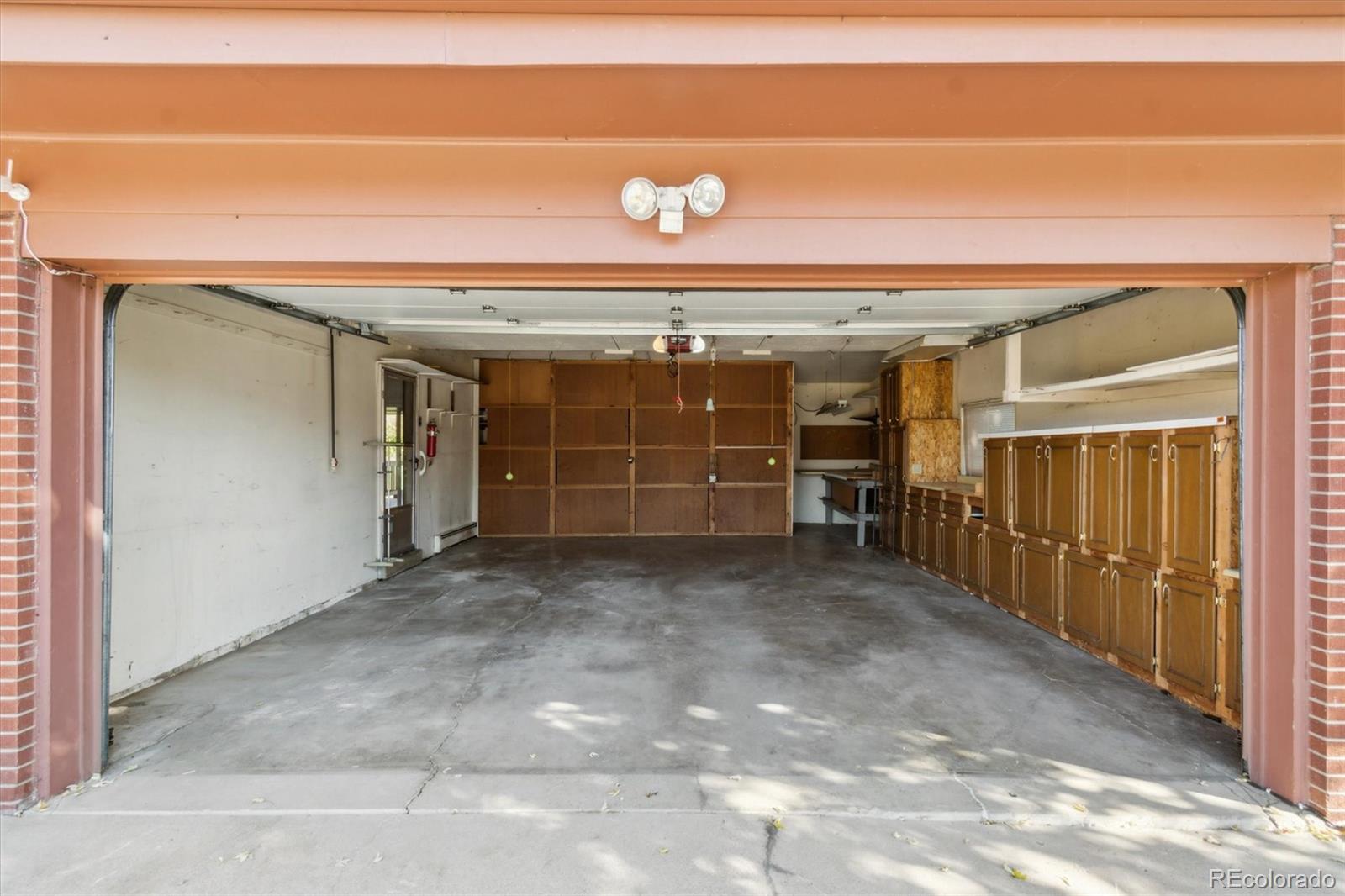20 Rangeview Place Wheat Ridge, CO 80215 - Photo 11 of 49 a view of a car garage door